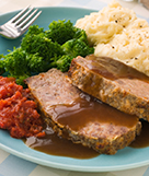 Mama's Meatloaf with Mashed Potato Broccoli Tomatoes and Gravy