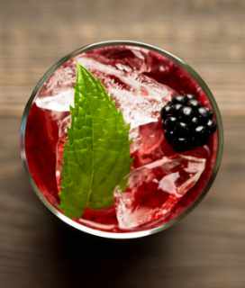 Image of a glass of Blackberry Prosecco Punch from above