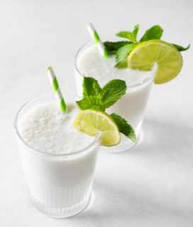 Photo of two cups of the Coconut Gin Fizz reipe