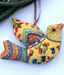 Photo of a bird ornament from the 2022 KPFA Craft Fair