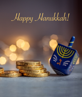 Image of a dreidel that says Happy Hanukkah from Piedmont Grocery