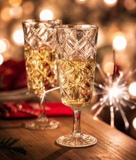 Photo of champaign flutes for New Year's Holiday Hours 2022