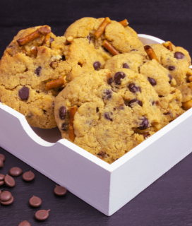Photo of Chocolate Chip Pretzel Cookies in a white box on a dark background