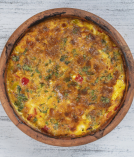 Photo of a Baked Western Omelet on a wooden table