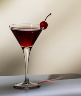 The Rose Cocktail against a shadowy background