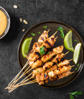 Photo of Grilled Chicken Satay Skewers with peanut sauce