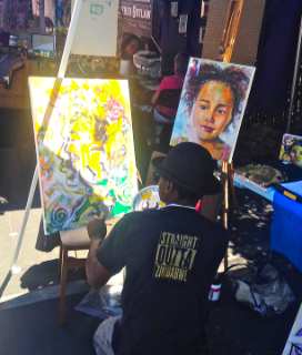Image of a painter at Alameda Summer Art Fair