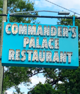 Photo of the Commander's Palace sign for Pecan-Crusted Fish with Crab Salad and Crushed Corn Sauce Recipe