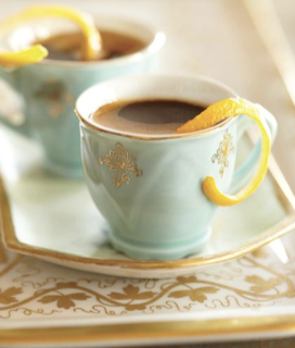 Photo of two cups of Medaglia d’Oro Instant Espresso with lemon twist