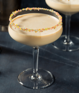 Photo of the Sugar Cookie Martini with a rim of sprinkles