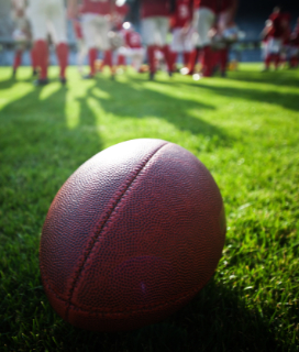 Photo of a ball on the field for College Football Season
