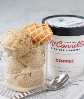Photo of a glass of McConnell's Coffee Ice Cream with a cookie and a spoon