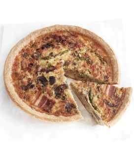 Photo of a Starter Bakery Quiche Lorraine with a slice being taken out