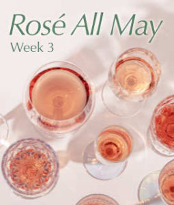 Photo of rosé wine in glass on a table for Rosé All May Week Three