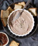 A bowl of Trois Petits Cochons Paté served with crackers